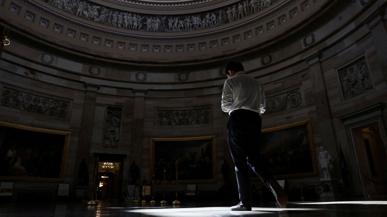 A man walks through the U.S. Capitol rotunda on the second day of a partial shutdown of the federal government at the U.S. Capitol in Washington, D.C., U.S., October 2, 2025. REUTERS/Jonathan Ernst     TPX IMAGES OF THE DAY     