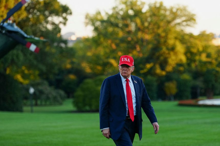 President Donald Trump arrives at the White House on October 5.
