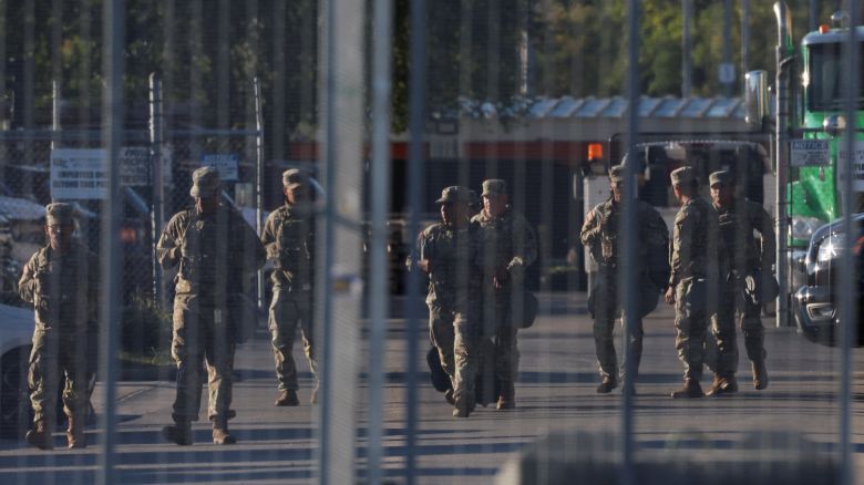 National Guard members walk at the Immigration and Customs Enforcement Broadview facility in Chicago on Thursday.