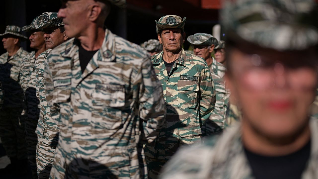 Members of the Bolivarian Militia stand in formation during a military training, amid rising tensions with the US in Caracas, Venezuela on October 11, 2025.