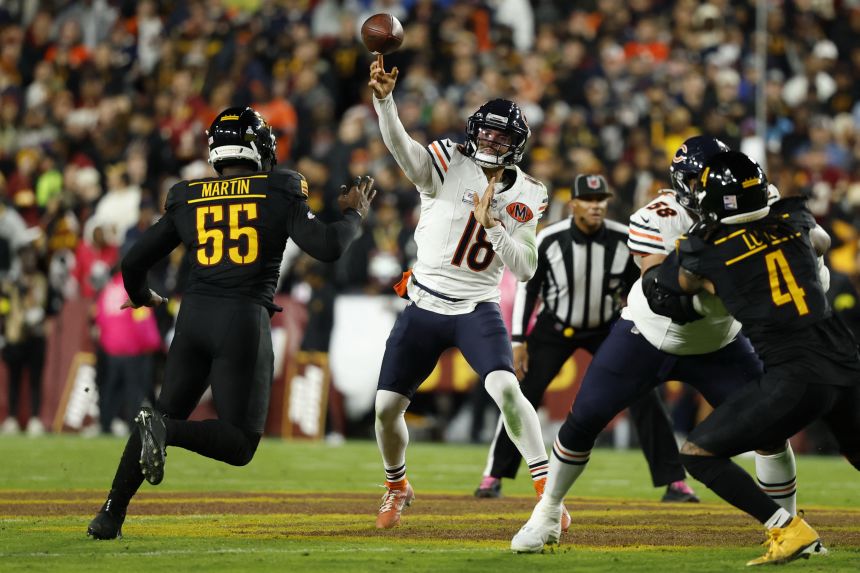 Bears quarterback Caleb Williams makes a pass against the Commanders.