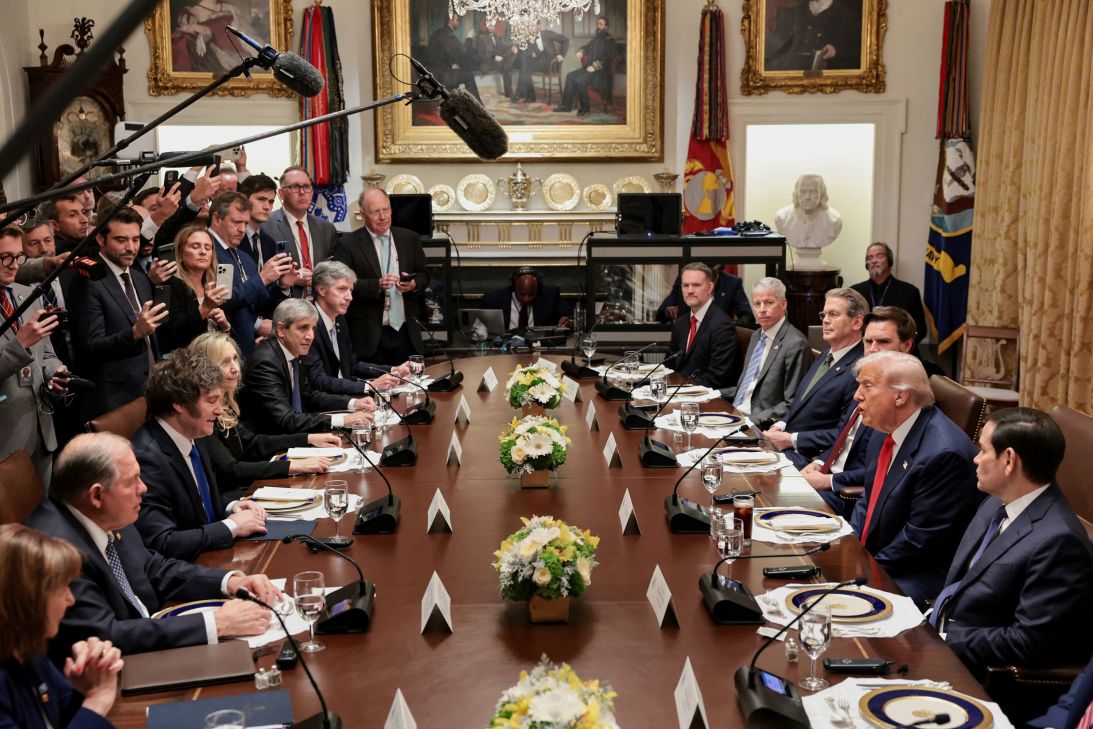 President Donald Trump, next to U.S. Secretary of State Marco Rubio and Vice President JD Vance, sits down to lunch with Argentina's President Javier Milei in the White House in Washington, DC, on October 14.