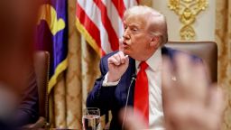 President Donald Trump gestures during a lunch with Argentina’s President Javier Milei in the Cabinet Room of the White House on October 14, 2025.