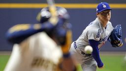 Yoshinobu Yamamoto threw the MLB's first complete postseason game in 8 years to give the Los Angeles Dodgers 2-0 lead against the Milwaukee Brewers in the NLCS.
