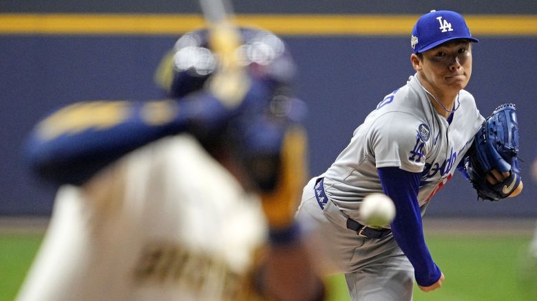 Yoshinobu Yamamoto threw the MLB's first complete postseason game in 8 years to give the Los Angeles Dodgers 2-0 lead against the Milwaukee Brewers in the NLCS.