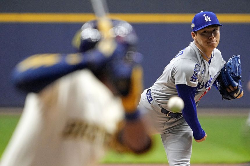 Yoshinobu Yamamoto threw MLB's first postseason complete game in 8 years to give the Los Angeles Dodgers 2-0 lead against the Milwaukee Brewers in the NLCS.