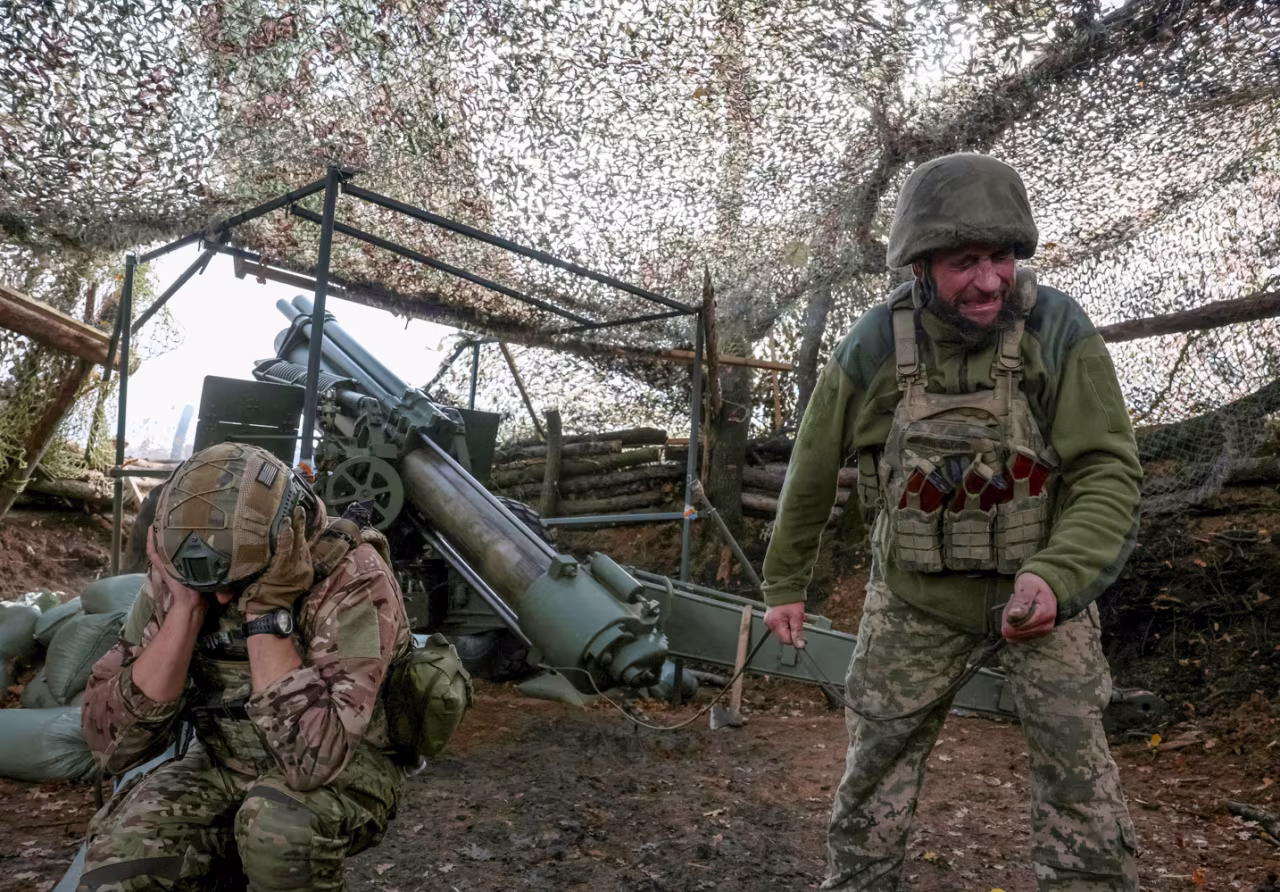Artillerymen of the 152nd Separate Jaeger Brigade fire an M114 self-propelled howitzer towards Russian troops, near the frontline town of Pokrovsk in Ukraine's Donetsk region, on October 15.