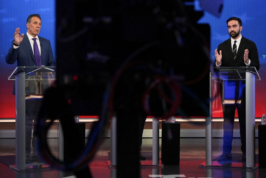 Independent candidate Andrew Cuomo and Democratic candidate Zohran Mamdani participate in a mayoral debate in New York on October 16.