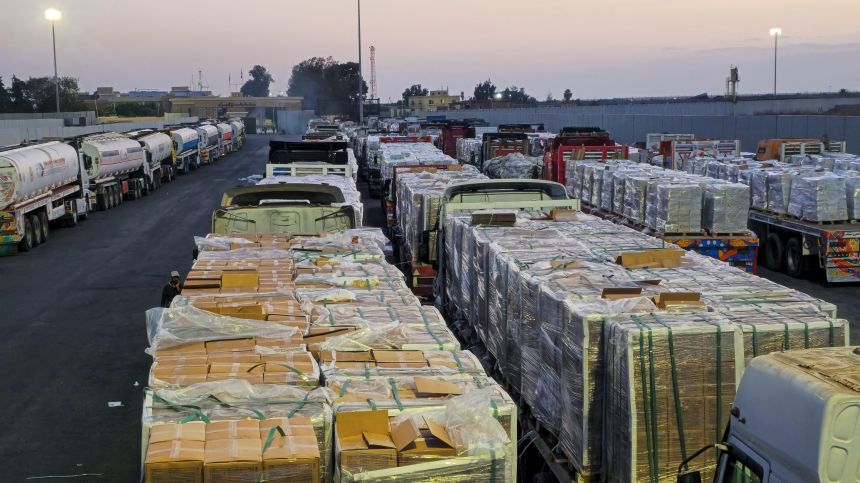 Trucks carrying humanitarian aid and fuel line up at the crossing into the Gaza Strip at the Rafah border on the Egypt side, amid a ceasefire between Israel and Hamas in Gaza, in Rafah, Egypt on Friday.