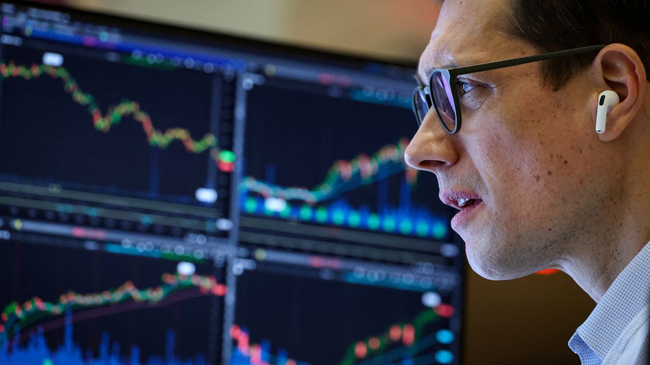 A Futures-options trader works on the floor at the American Stock Exchange (AMEX) at the New York Stock Exchange (NYSE) in New York City, U.S., October 17, 2025.