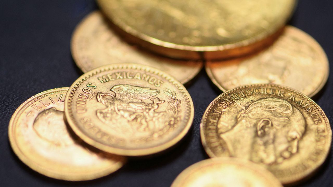 Gold coins are pictured at the local shop of goldsmith Axel Harbaum-Neuhaus in Bonn, Germany on Tuesday, as gold prices rise and many trade in their golden possessions.