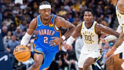 Oct 23, 2025; Indianapolis, Indiana, USA; Oklahoma City Thunder guard Shai Gilgeous-Alexander (2) dribbles the ball while Indiana Pacers guard Bennedict Mathurin (00) defends in the second half at Gainbridge Fieldhouse.