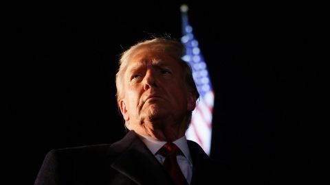 President Donald Trump looks on as he departs the White House on October 24.