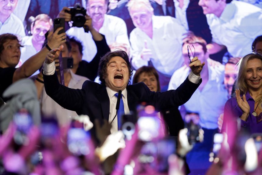 Argentina's President Javier Milei celebrates after the La Libertad Avanza party won the midterm election