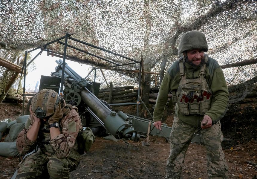 Ukrainian artillerymen fire towards Russian troops near the frontline town of Pokrovsk in Donetsk region, Ukraine, on October 15, 2025.