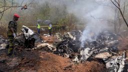 Security officials secure the wreckage of the aircraft 5Y-CCA operated by Mombasa Air Services, which crashed with 12 passengers onboard on its way from Diani to Kichwa Tembo, at the Tsimba Golini area in Kwale County, Kenya, on Tuesday, October 28.