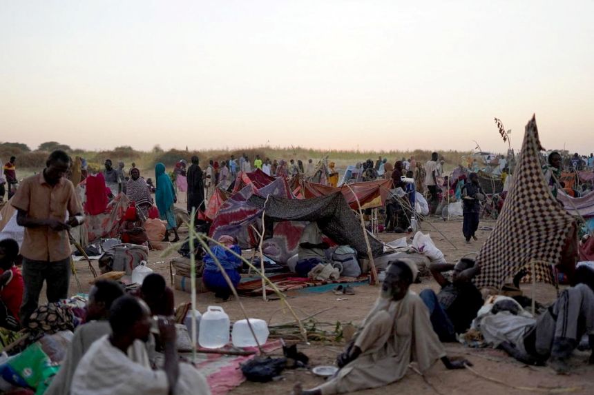 Families fleeing El Fasher gather at a camp in Taouira.
