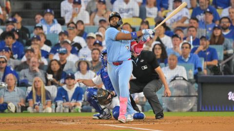 Toronto Blue Jays first baseman Vladimir Guerrero Jr. hits a two run home run in the third inning at Dodger Stadium in Los Angeles.