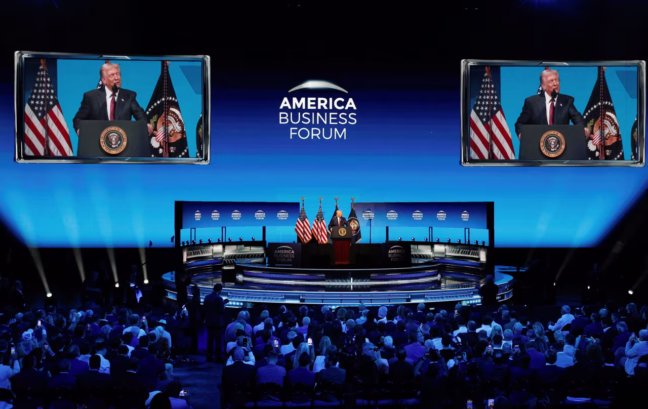 President Donald Trump delivers remarks at the America Business Forum in Miami, on Wednesday.