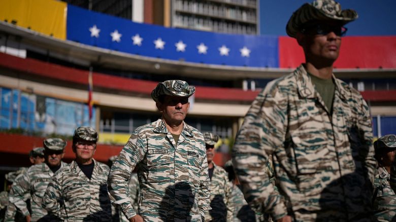 Members of the Bolivarian Militia stand in formation during a military training, amid rising tensions between the US and Venezuela, in Caracas, Venezuela, on October 11, 2025.
