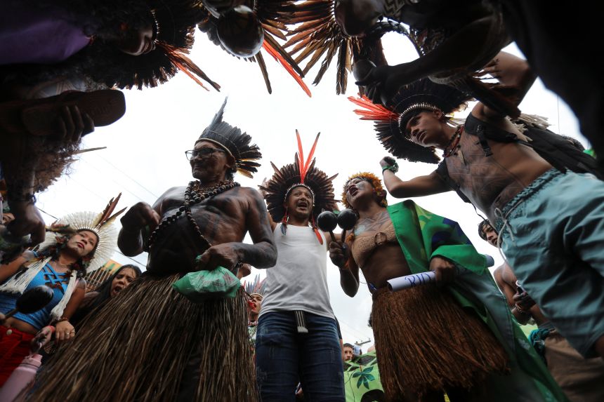 Indigenous demonstrators gather outside the United Nations Climate Change Conference (COP30) venue in Belém, Brazil, on November 11, 2025.