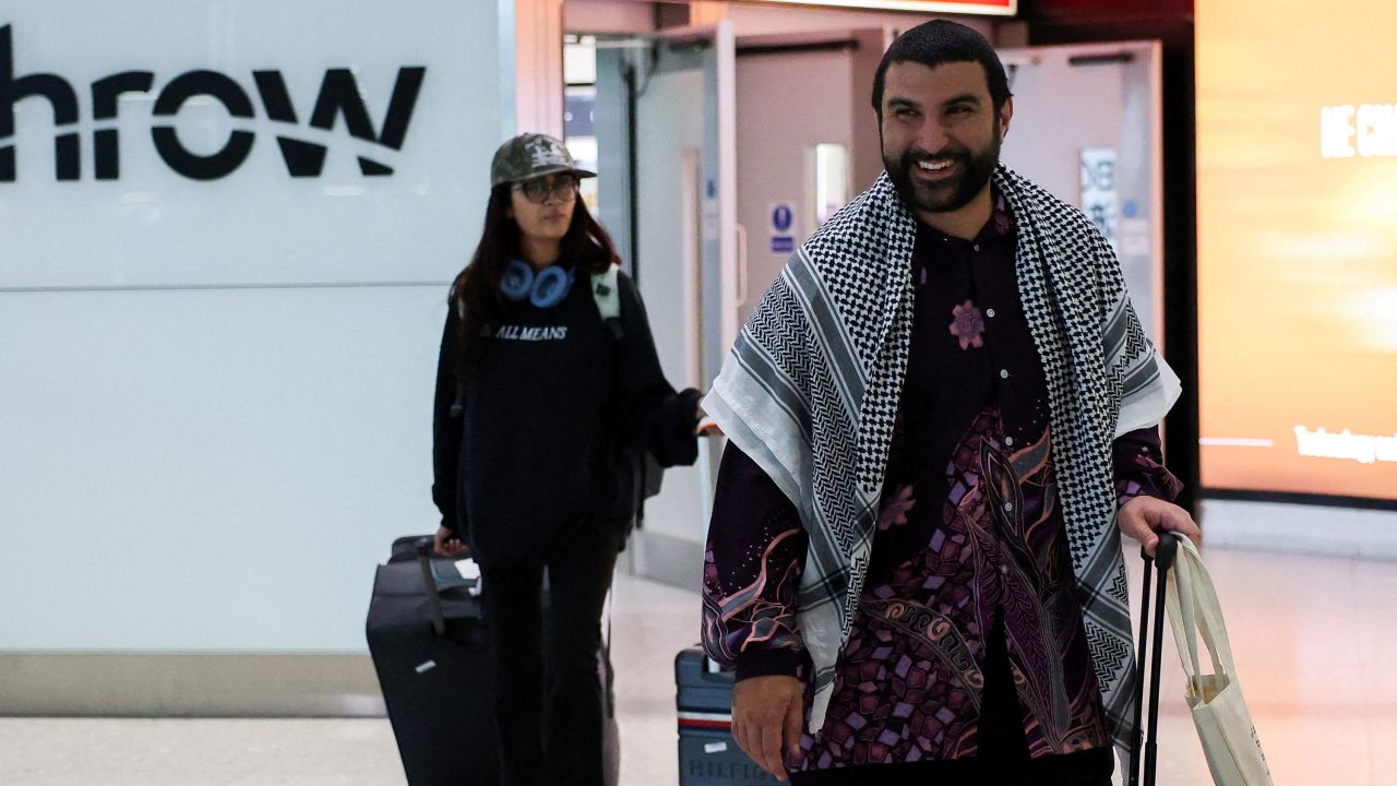British pro-Palestinian commentator Sami Hamdi arrives at London Heathrow Terminal 2, after being detained by U.S. immigration authorities for more than two weeks, in Greater London, Britain, November 13, 2025.