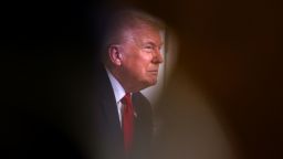 President Donald Trump participates in a call with service members of the US military, in Palm Beach, Florida, on November 27.