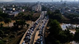 A drone view shows traffic blocked by vehicles parked on a road to escape floodwaters in Hat Yai district, Songkhla province, Thailand on November 30, 2025.