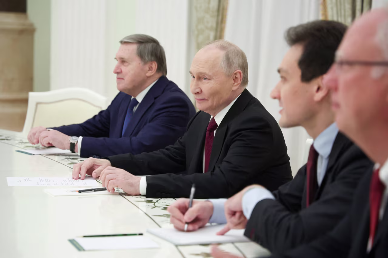 Members of the Russian delegation, led by President Vladimir Putin, center, attend a meeting with U.S. President Donald Trump's special envoy Steve Witkoff and son-in-law Jared Kushner at the Kremlin in Moscow, Russia, on Tuesday.