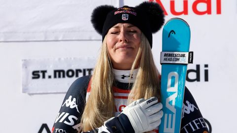 Alpine Skiing - FIS Alpine Ski World Cup - Women's Downhill - St. Moritz, Switzerland - December 12, 2025 Lindsey Vonn of the U.S. celebrates on the podium after winning the Women's Downhill