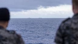 HMAS Stuart monitors the Chinese Navy's Fuchi-class (right) and Renhai-class cruiser Zunyi as they conduct replenishment at sea off the coast of Western Australia, March 3.