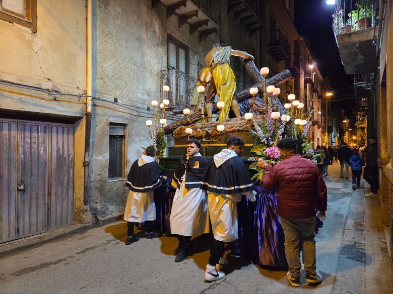 Each cart is pushed by a member of their respective guild.