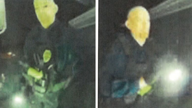 An image released by the US Attorney's Office shows Boelter knocking on a public official's door.