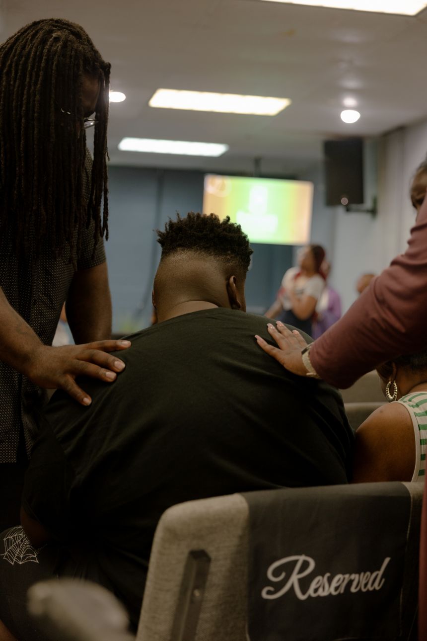JJ receives prayers at church in San Antonio.