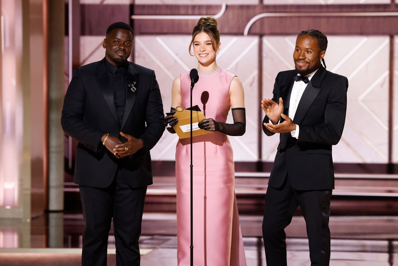 Daniel Kaluuya, Hailee Steinfeld and Shameik Moore present an award at the Golden Globes. 