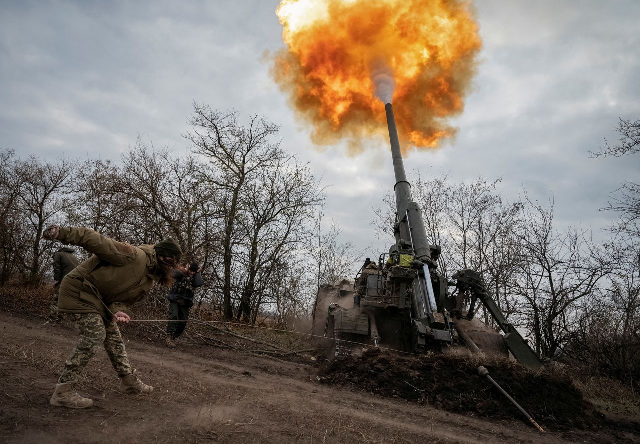 A Ukrainian servicewoman fires a 2S7 Pion self-propelled gun at a position on the frontline in?Kherson?region, Ukraine, on November 9.