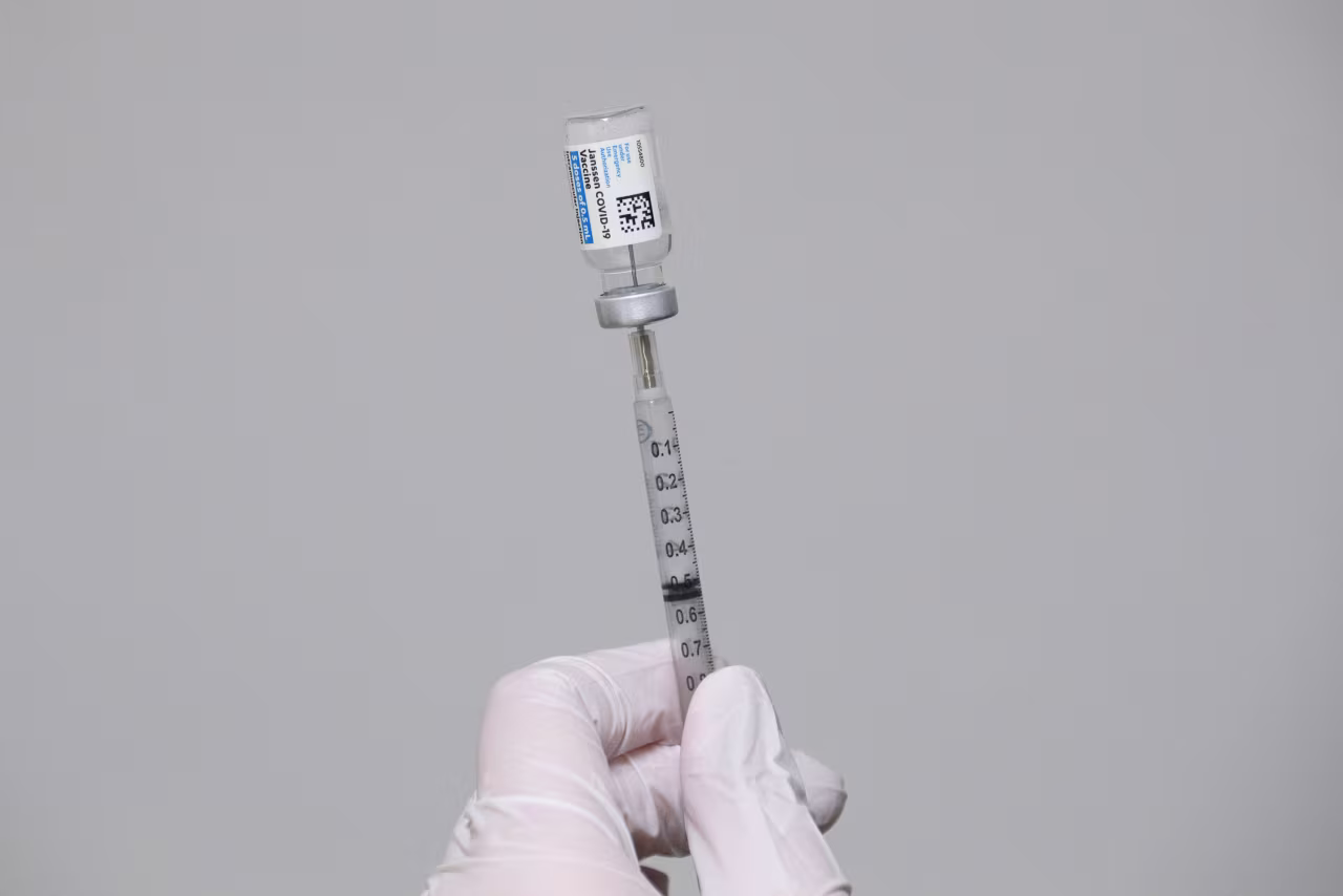 A syringe is filled with a dose of the Johnson & Johnson Janssen Covid-19 vaccine at a vaccination site inside Reuther Hall at Forty Acres on March 13 in Delano, California. 