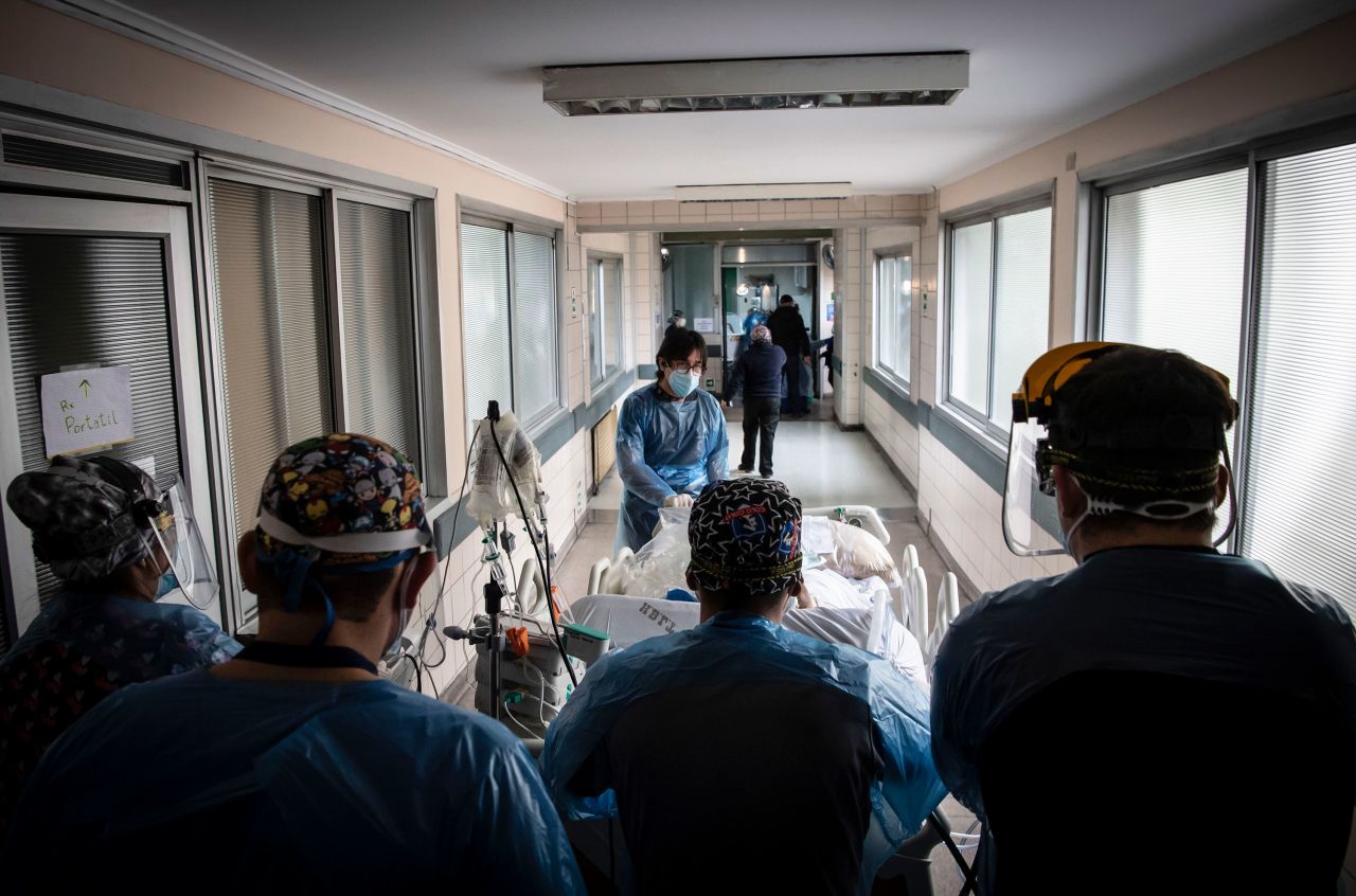 Nurses transfer a patient at Barros Luco Hospital in Santiago, Chile, on June 24.