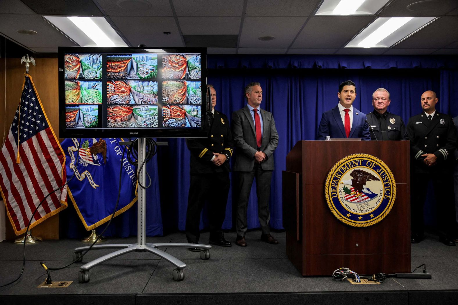 Authorities in Los Angeles hold a news conference on Wednesday, October 8, to <a href="index.php?page=&url=https%3A%2F%2Fwww.cnn.com%2F2025%2F10%2F08%2Fus%2Fpalisades-fire-arrest-california">announce the arrest of a man</a> who they suspect started the devastating Palisades Fire earlier this year. On the monitor are AI-generated images of a burning forest that the suspect allegedly prompted.