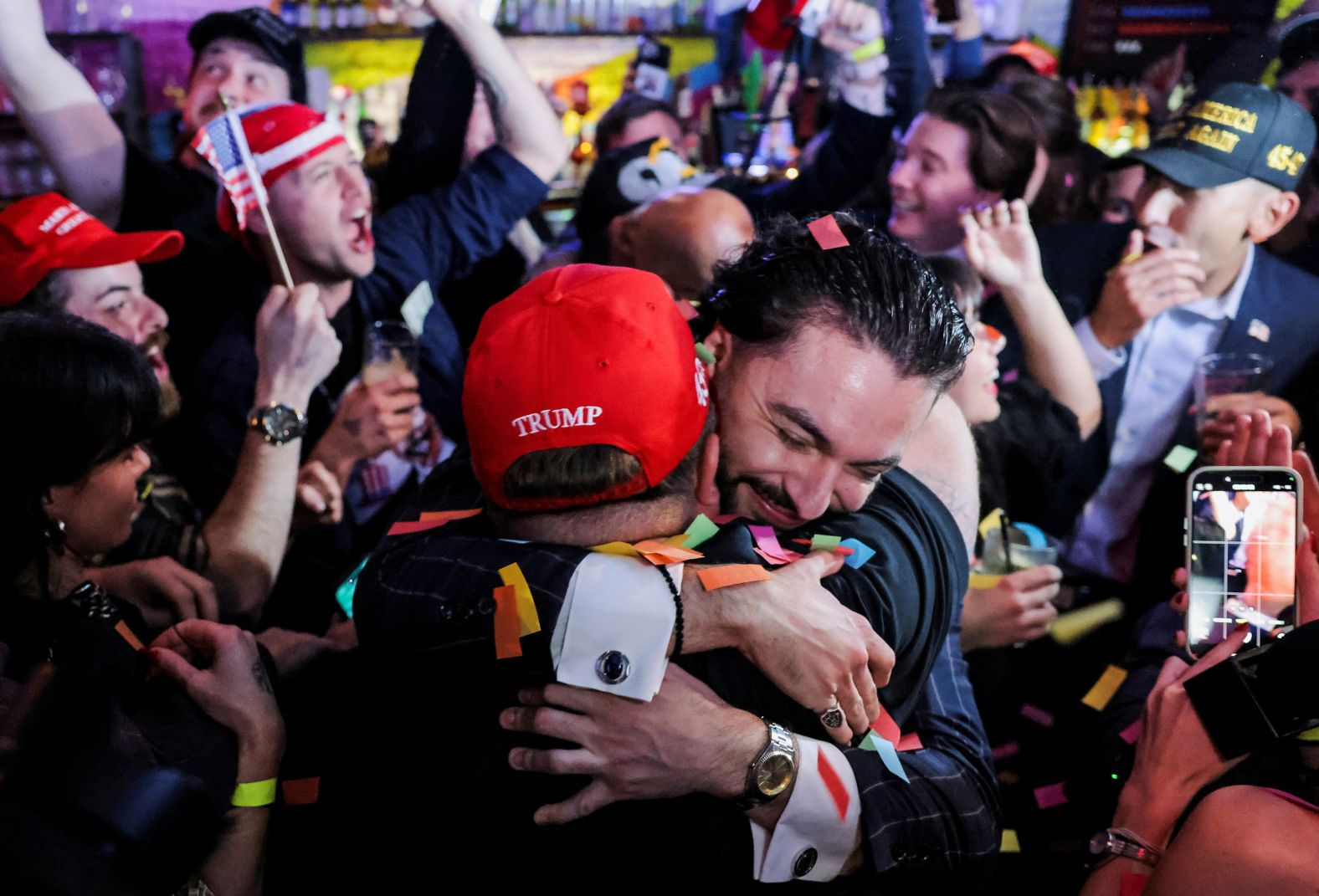 Supporters of former President Donald Trump react to election results at a watch party in New York on Wednesday, November 6.