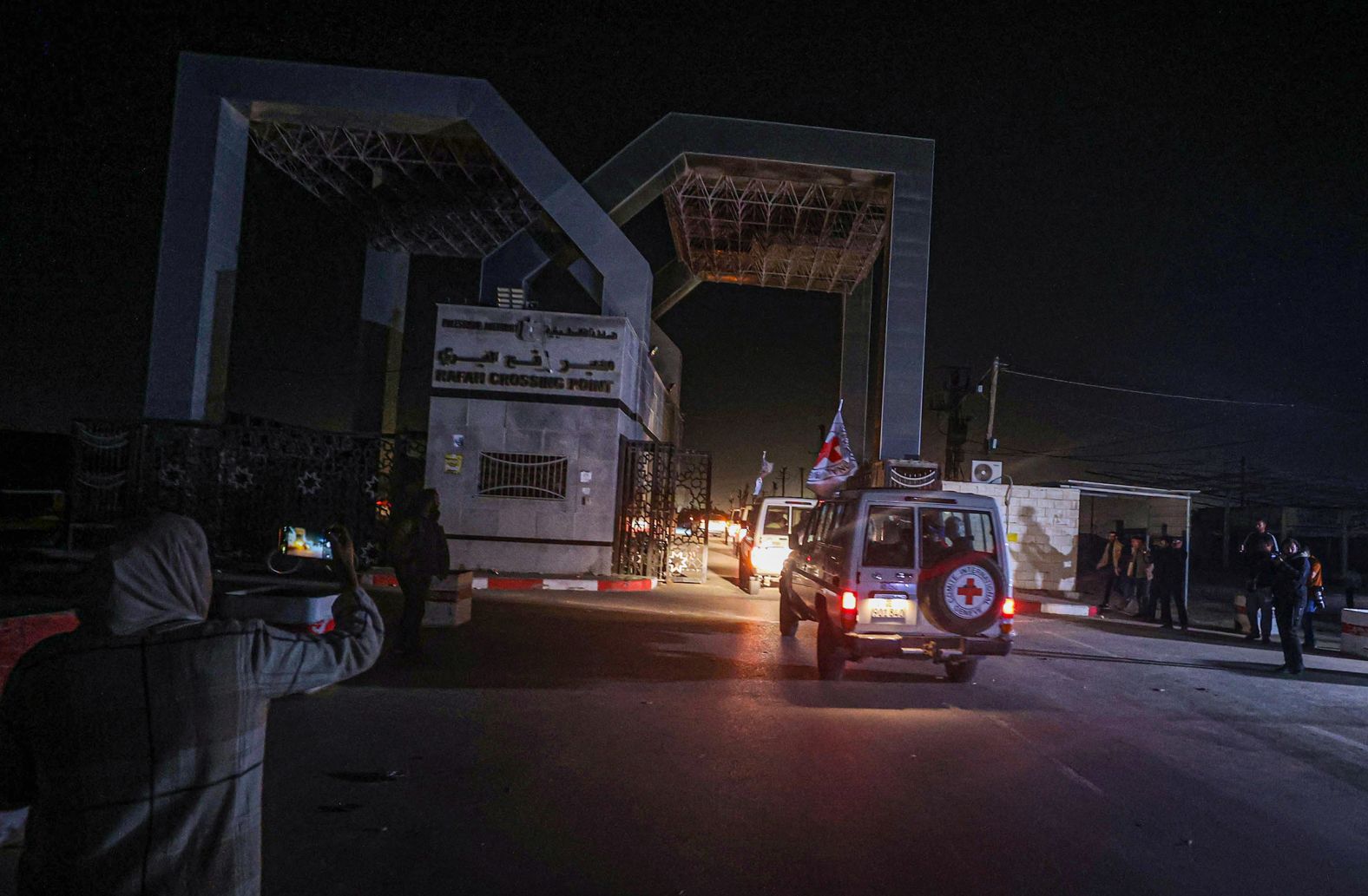 International Red Cross vehicles, carrying Israeli hostages released from Gaza, travel to the Rafah border crossing with Egypt on November 24. <a href="https://www.cnn.com/2023/11/23/middleeast/israel-hamas-hostage-release-delayed-intl-hnk/index.html">Israel and Hamas had agreed to a temporary truce</a>, with some civilian hostages and Palestinian detainees being released.