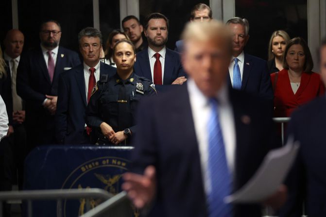 Vance watches Trump speaks to the media at Manhattan Criminal Court in New York in May 2024. Vance was one of several potential running mates and Republican lawmakers to stand by Trump’s side during his <a href="http://www.cnn.com/2023/03/31/politics/gallery/trump-indictment/index.html">criminal hush money trial</a>.