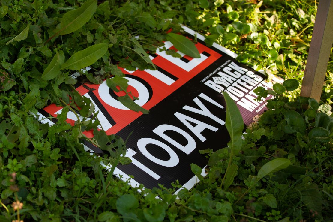 A voting sign lays in the grass last month outside a home on the outskirts of Sparta.