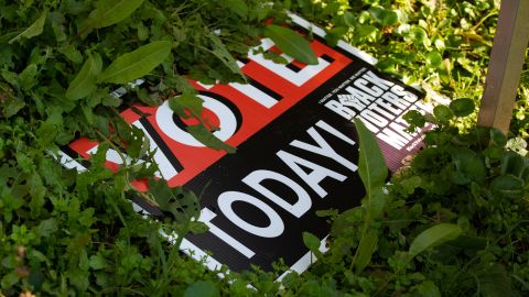 A voting sign lays in the grass last month outside a home on the outskirts of Sparta.