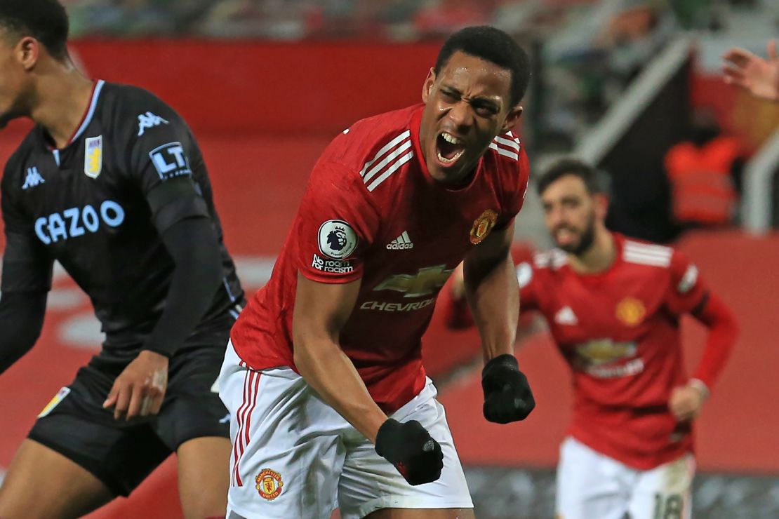 Manchester United's Anthony Martial celebrates after scoring the opening goal against Aston Villa on Friday, January 1.