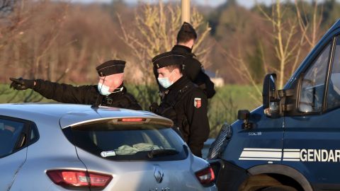 French gendarmes block access to the party about 40km south of Rennes on New Year's Day.