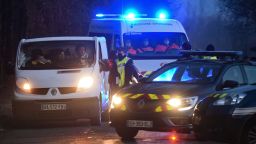 French Gendarmes control youths driving a van following the break up of a party near a disused hangar in Lieuron on January 2.