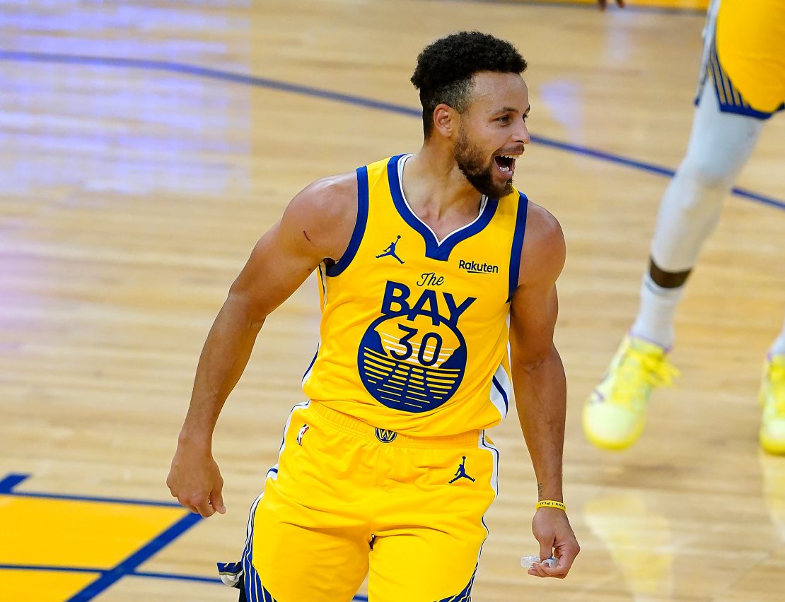 Curry smiles after scoring his 62 points.