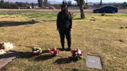 Rosa Cerna visits the graves of her dad and uncle who both died of Covid-19.
