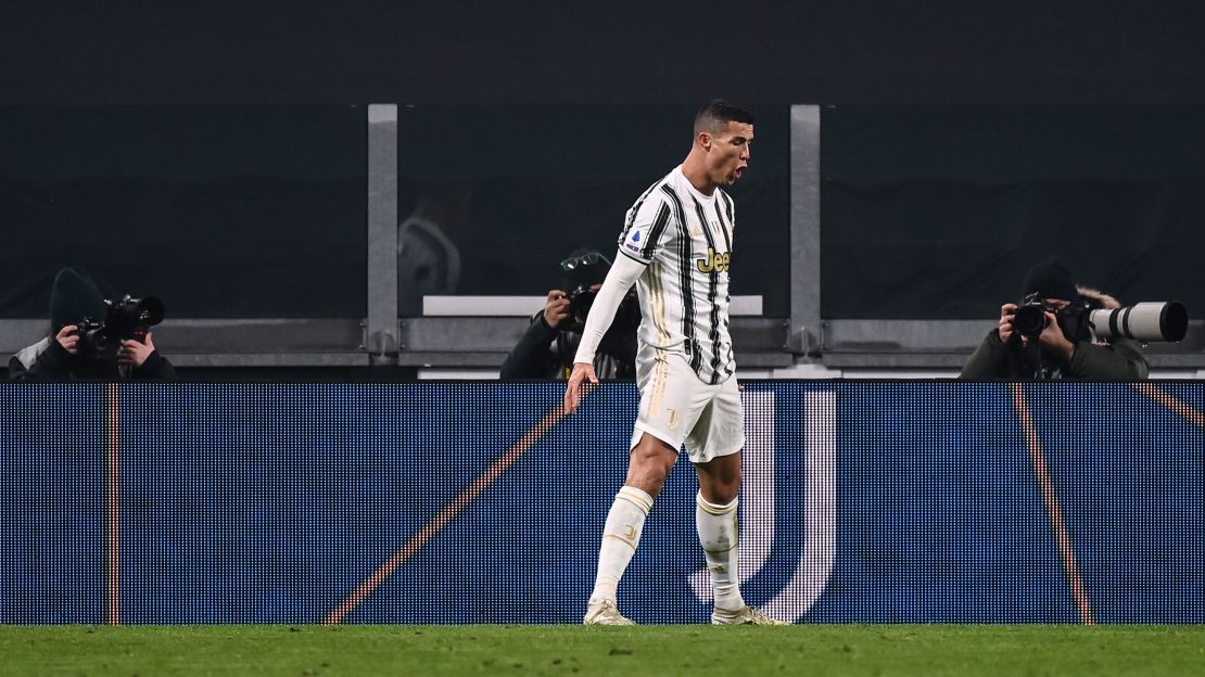 Cristiano Ronaldo celebrates after scoring his second goal against Udinese.